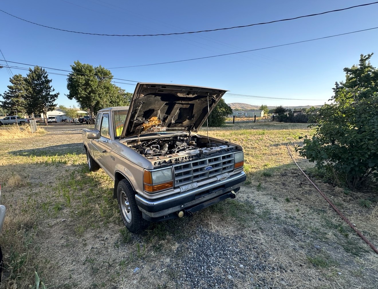 Ford truck being serviced outdoors